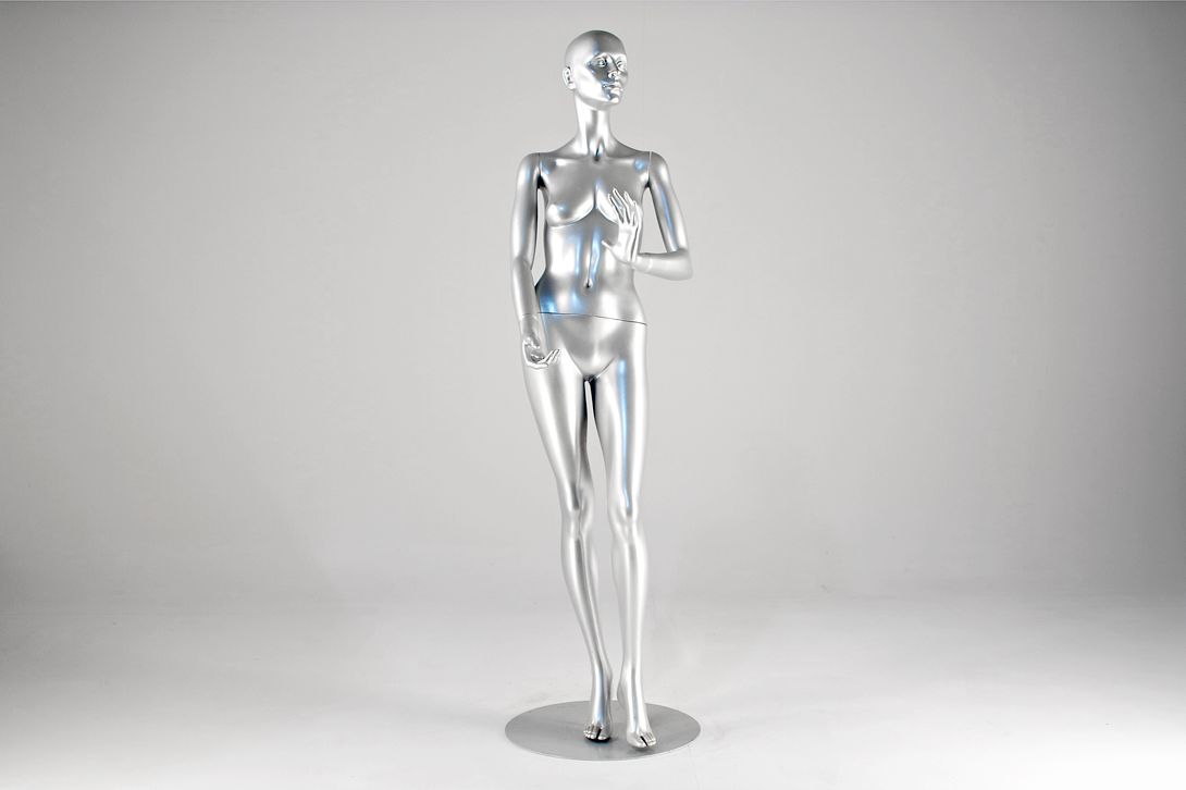 Foto Silver Female Mannequin with Head and Bowed Arm 1976