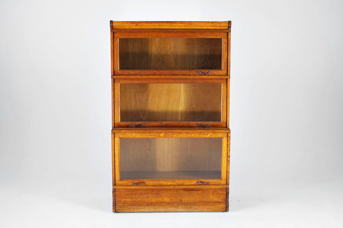 Foto Antique Wooden Bookcase with Glass Doors 1891