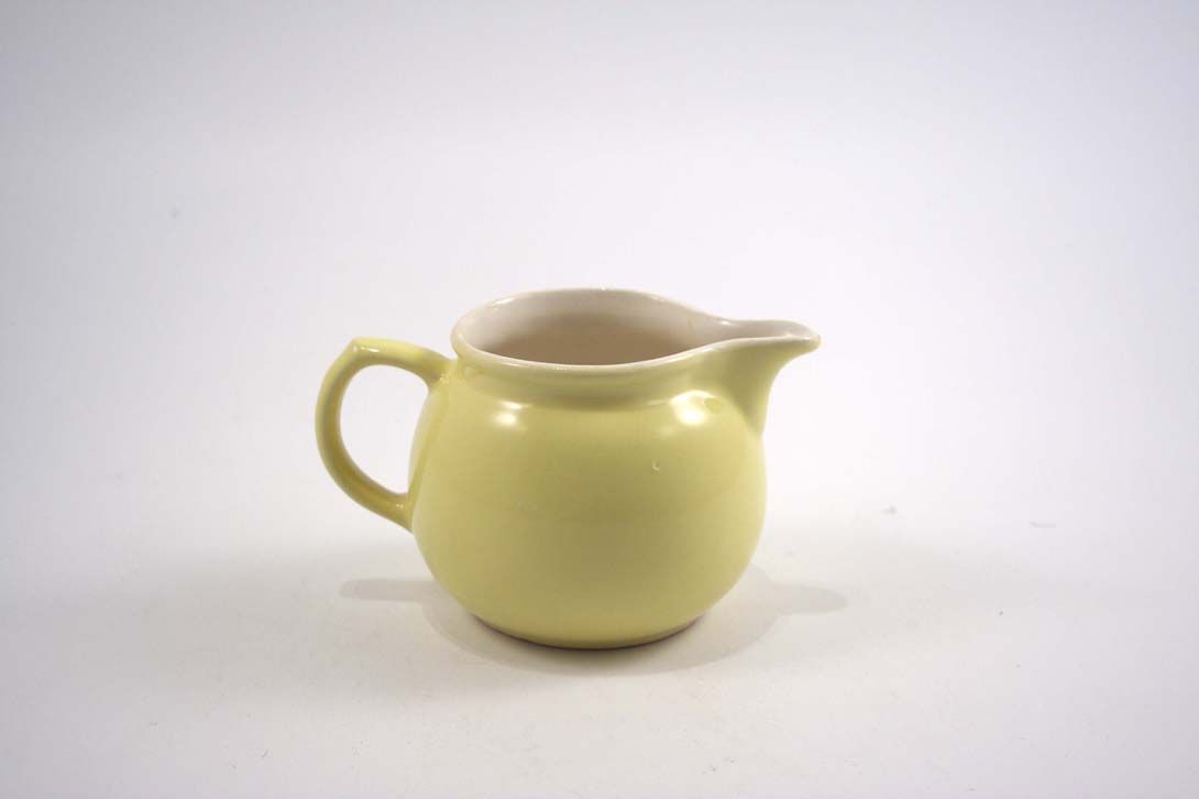 Foto Ceramic Milk Can Yellow White Inside
