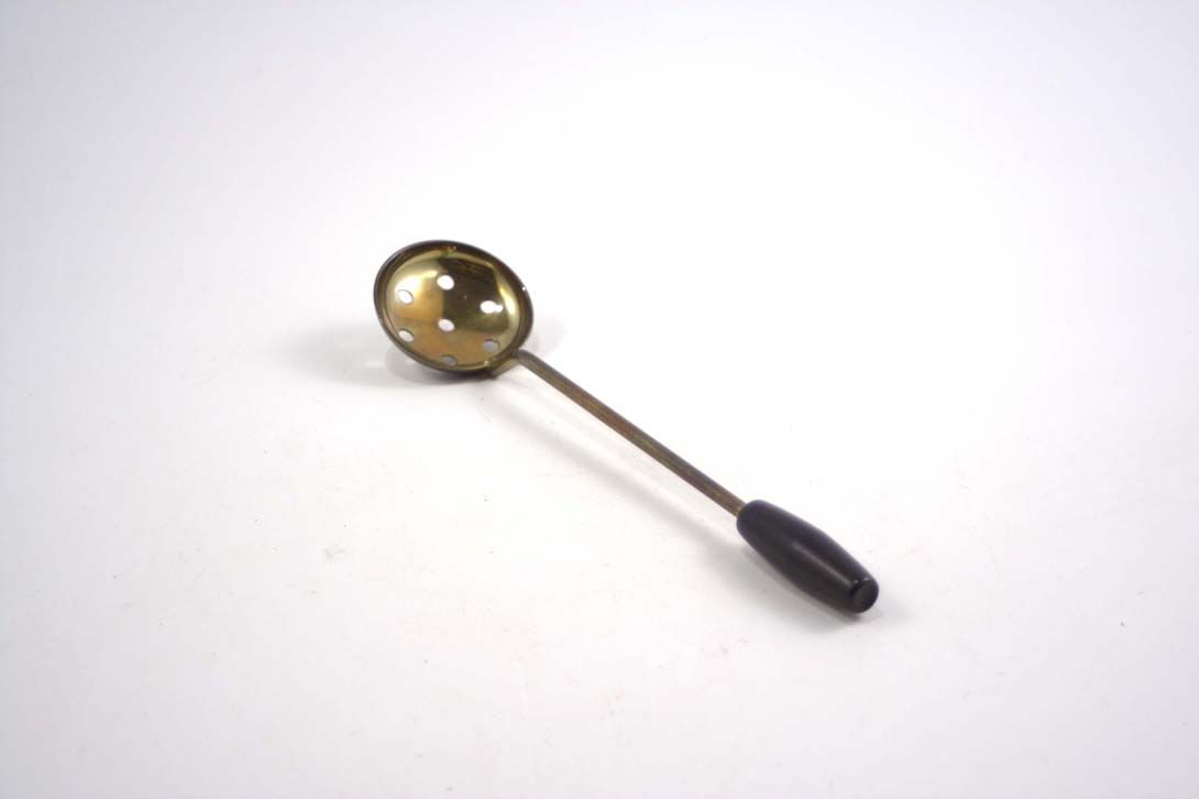 Foto Tin Slotted Spoon