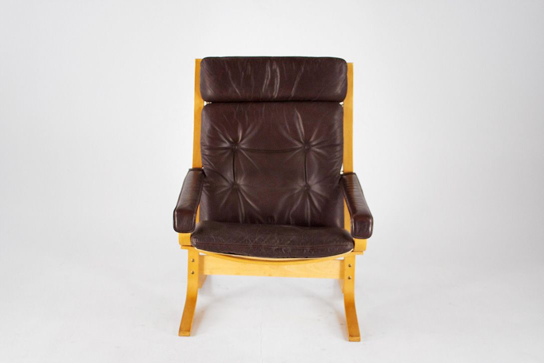 Foto Lounge Chair with Dark Brown Leather *