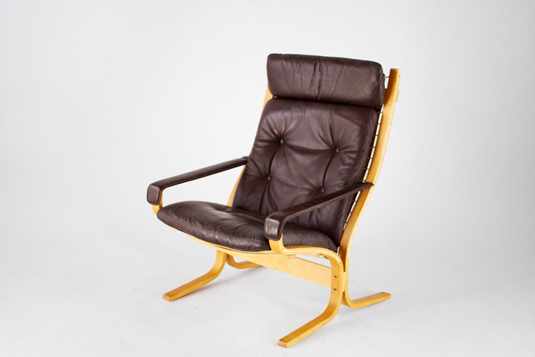 Foto Lounge Chair with Dark Brown Leather *