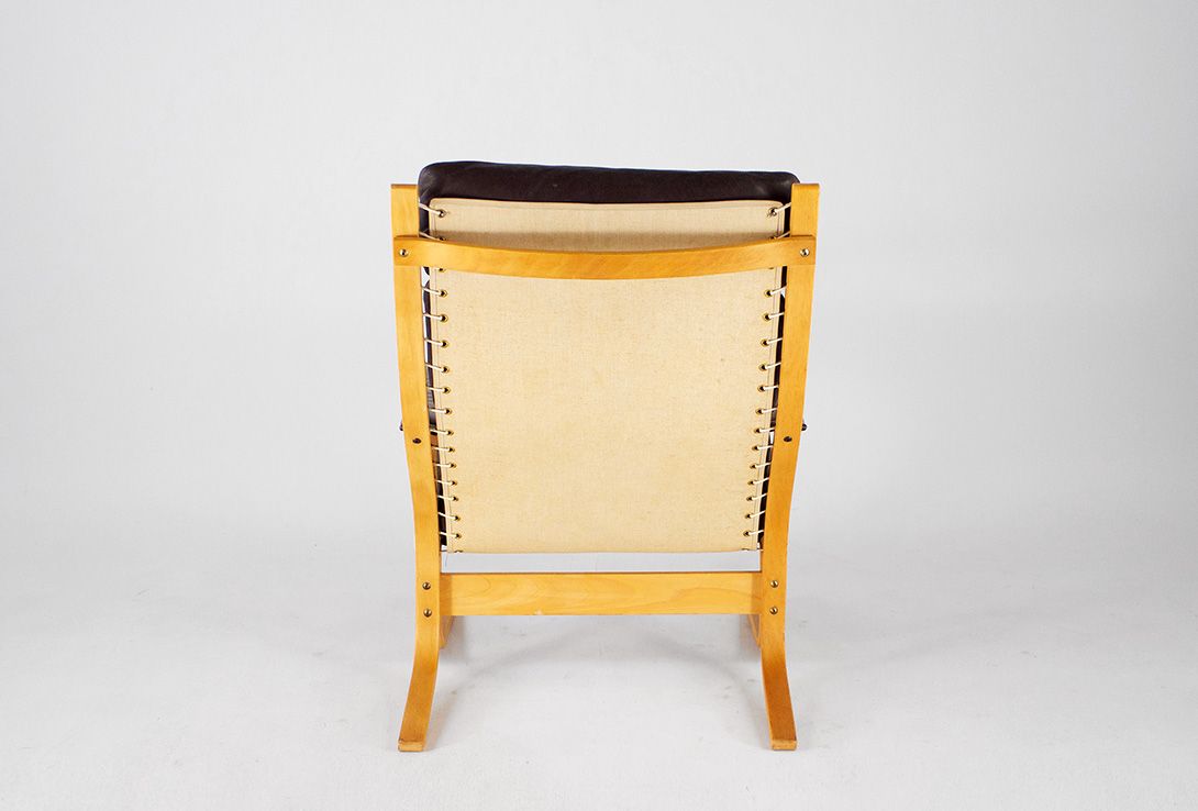 Foto Lounge Chair with Dark Brown Leather *