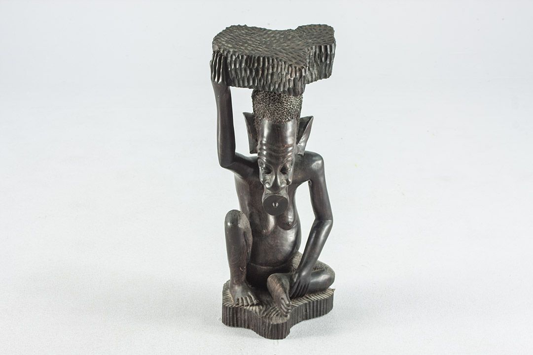 Foto African Sculpture, Nude Man Sitting, Holding Stone on Head