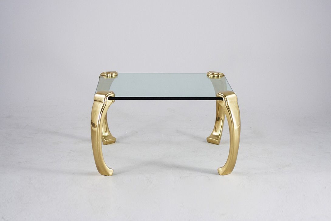 Foto Coffee Table with Curved Brass Legs and Glass Top 1973 ​h42x70x70