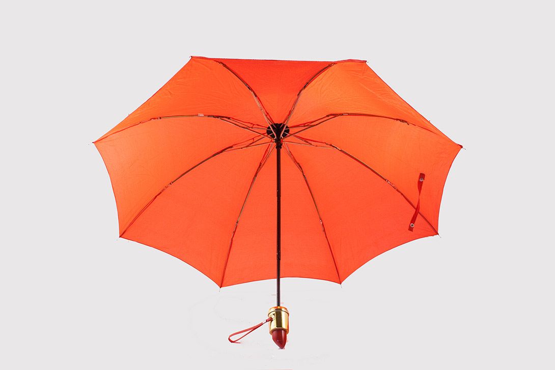 Foto Red Umbrella with Lipstick Handle
