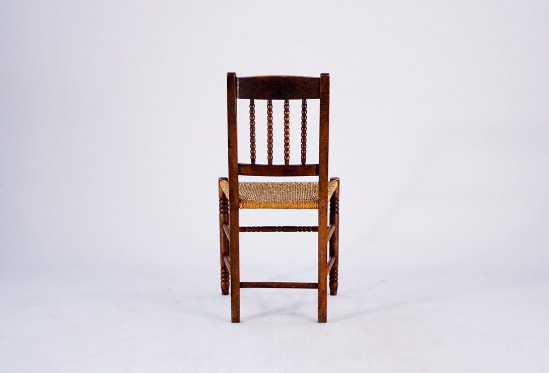 Foto 1890&#8217;s Wooden Kitchen Chair with Woven Seat and Lathed Frame