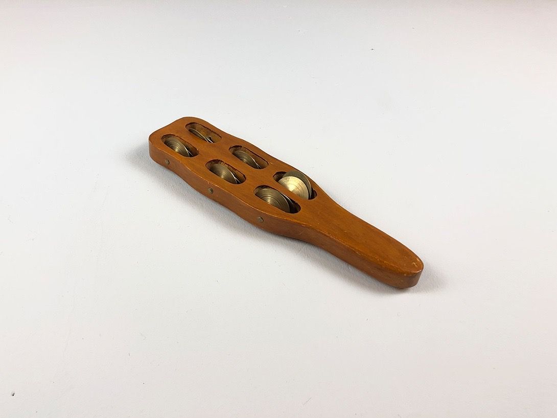 Foto Wooden Rattle with Brass