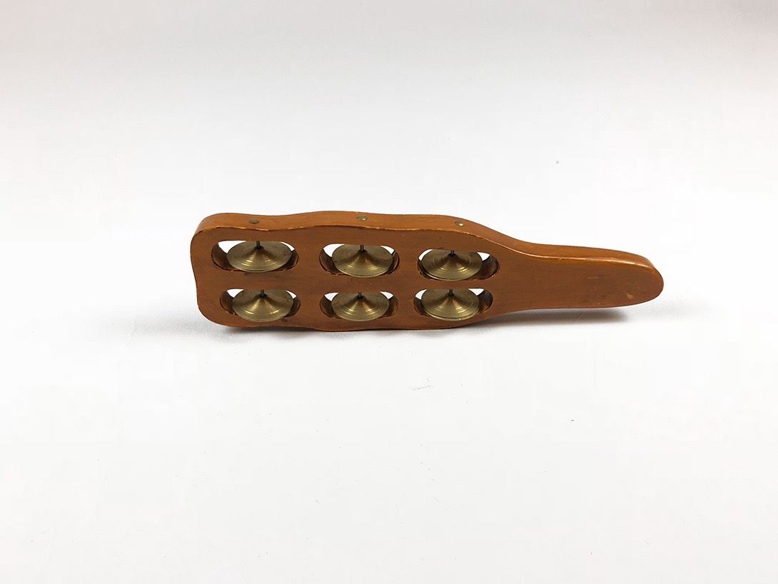 Foto Wooden Rattle with Brass