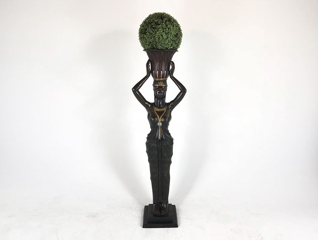 Foto Woman Holding Flowerpot with Fake Plant