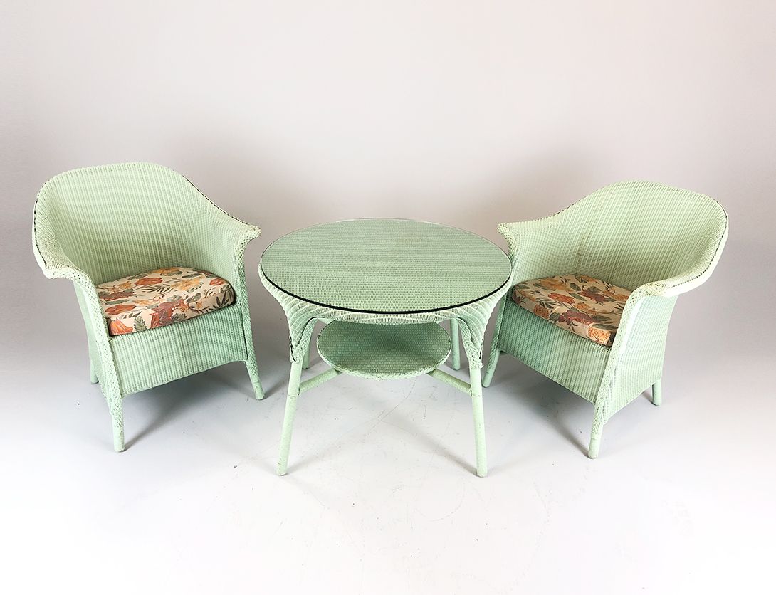 Foto Lloyd Loom Rattan Garden Armchair with Floral Cushion