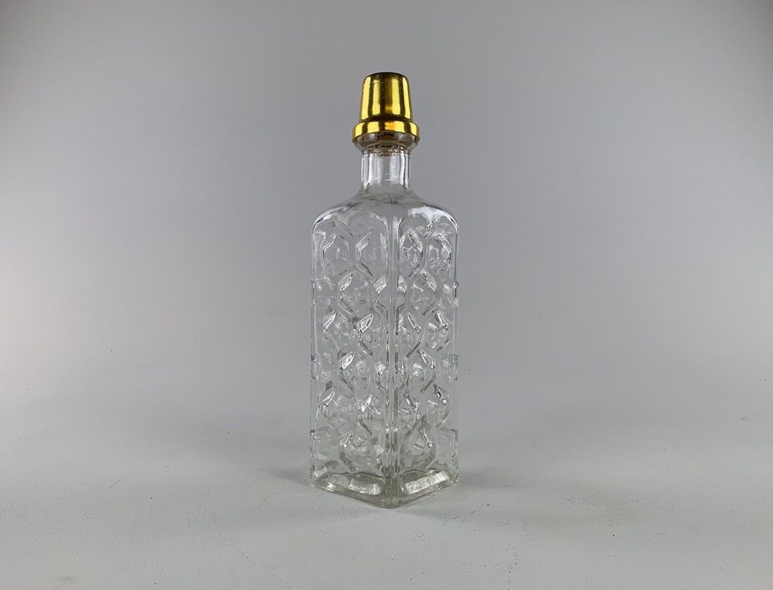 Foto Glass Bottle with Brass Cap