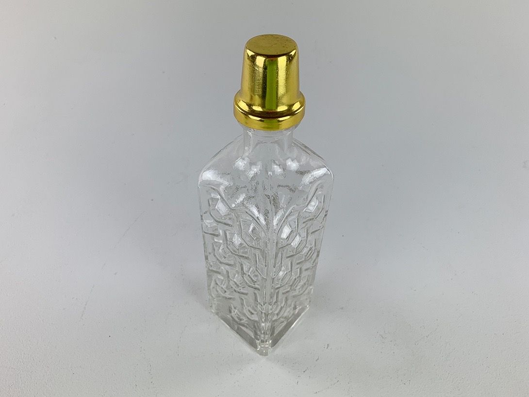 Foto Glass Bottle with Brass Cap