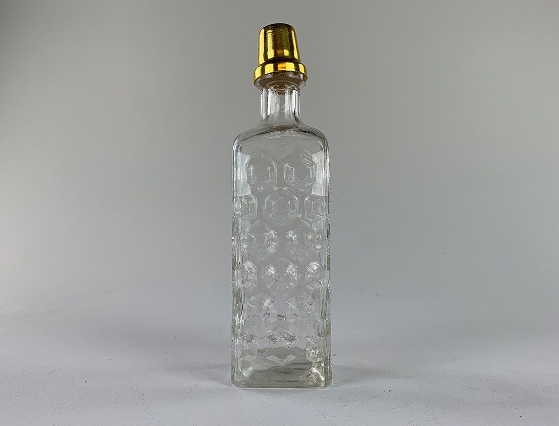 Foto Glass Bottle with Brass Cap