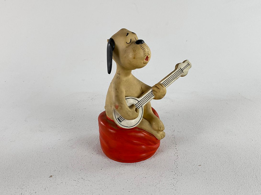 Foto Rubber Guitar Playing Dog Piggy Bank