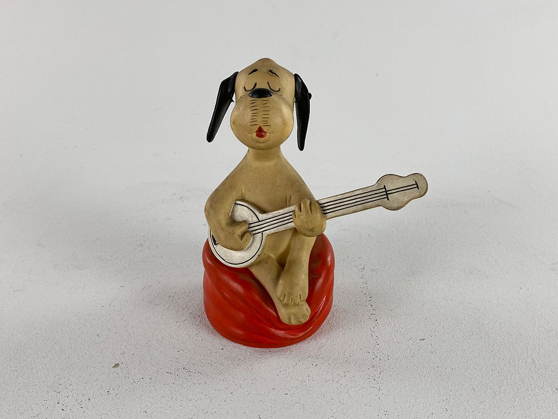 Foto Rubber Guitar Playing Dog Piggy Bank