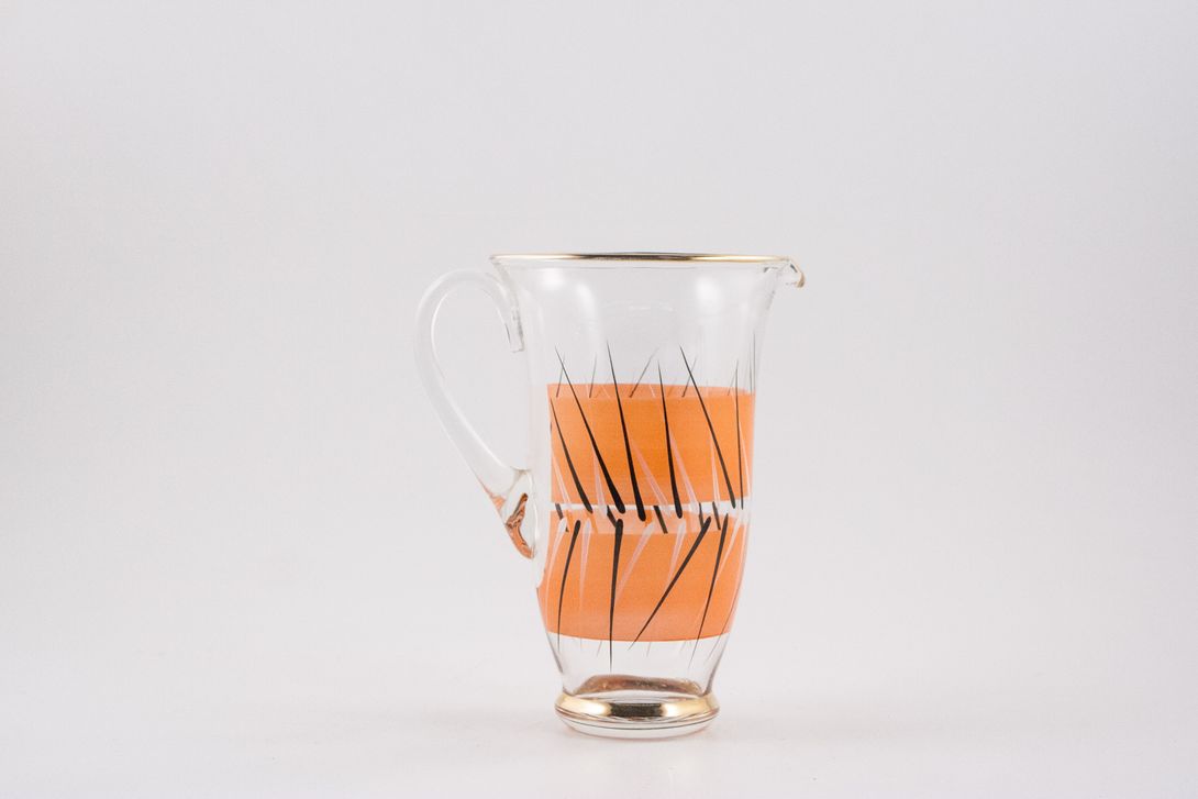 Foto Filigree Glass Jug with Orange and Brass Details