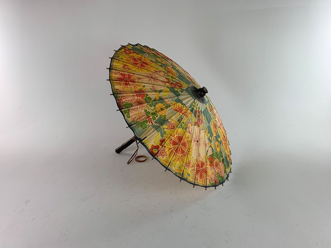 Foto Colorful Flowered and Checkered Umbrella