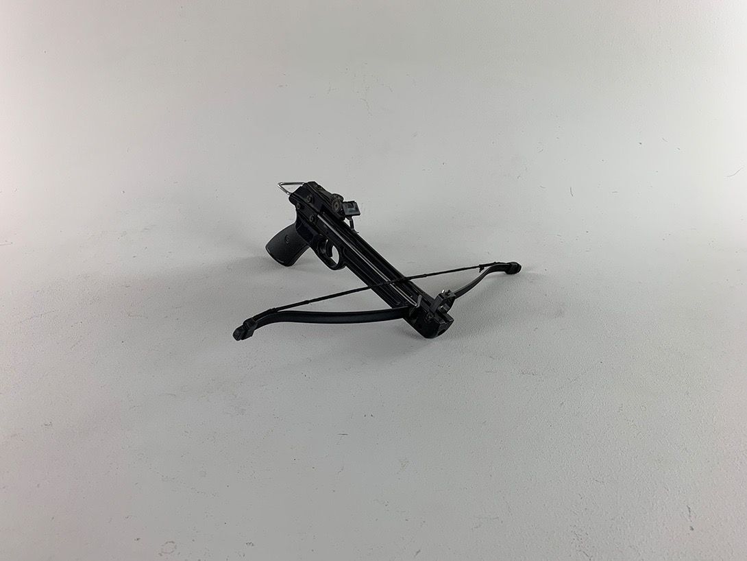 Foto Black Crossbow with Blue Arrow
