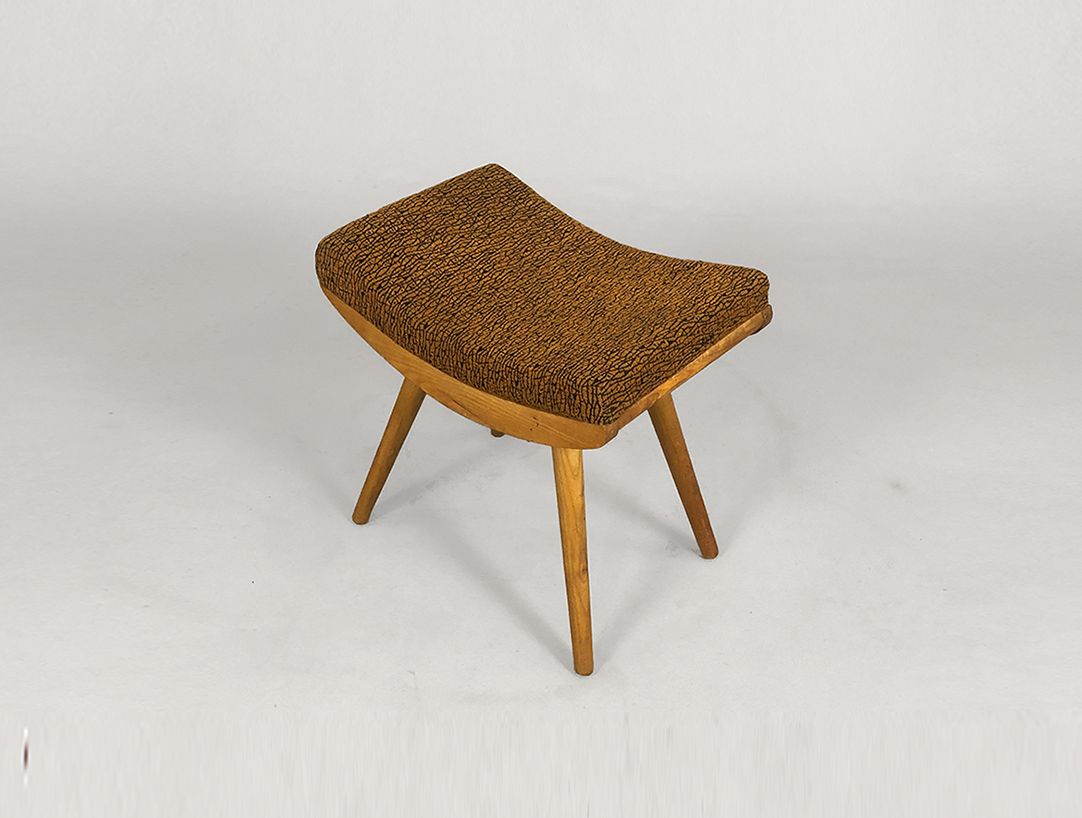 Foto Wooden Stool with Brown-Black Patterned Upholstery