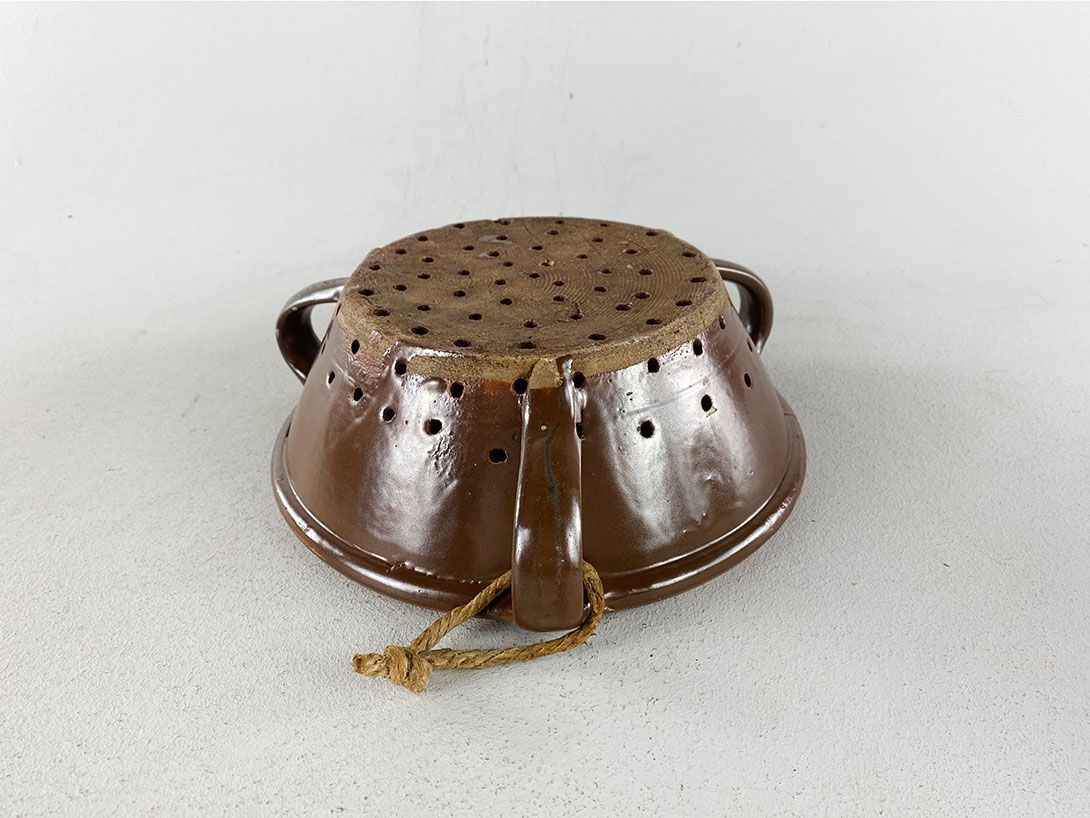 Foto Brown Ceramic Sieve