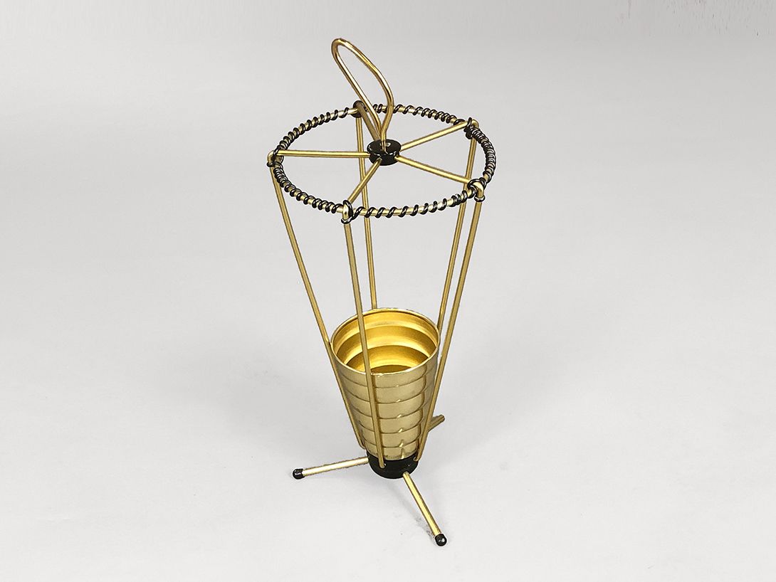 Foto Brass Umbrella Stand with Black Decorations