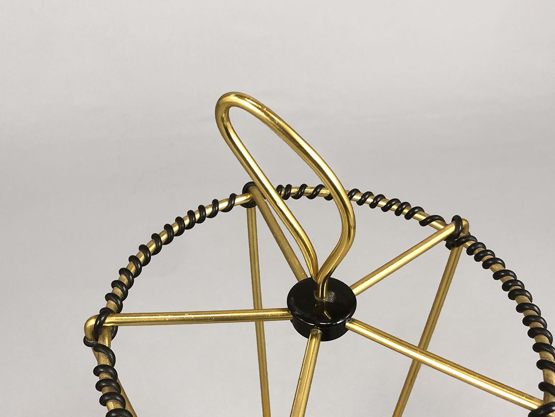 Foto Brass Umbrella Stand with Black Decorations