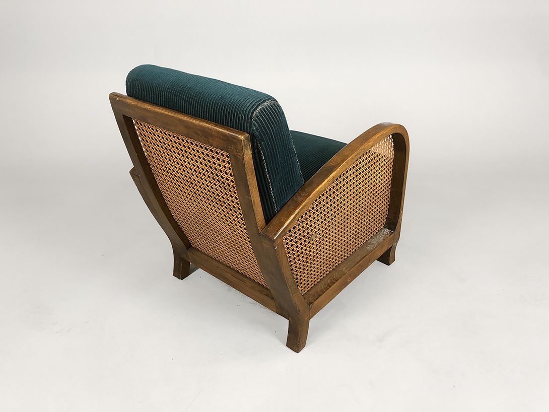 Foto Green Armchair with Basket Frame and Wooden Base