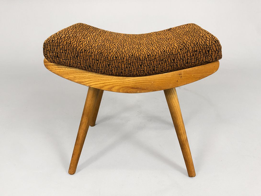 Foto Wooden Stool with Brown-Black Patterned Upholstery