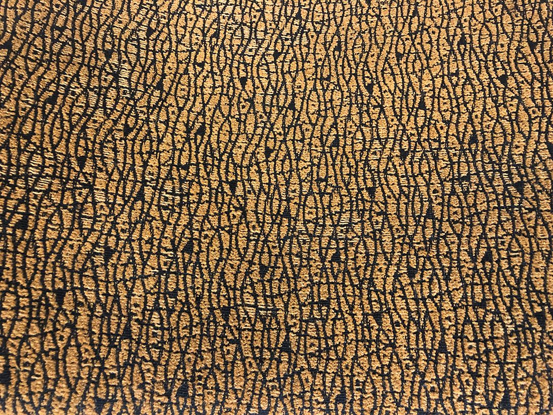 Foto Wooden Stool with Brown-Black Patterned Upholstery