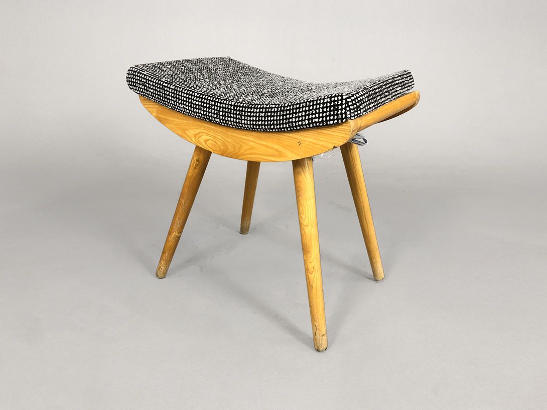 Foto Wooden Stool with Black-White Patterned Upholstery
