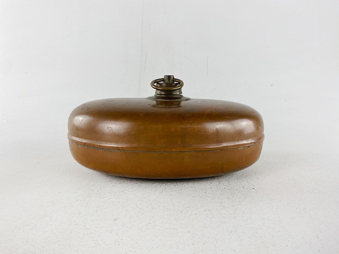 Foto Brown Metal Hot Water Bottle