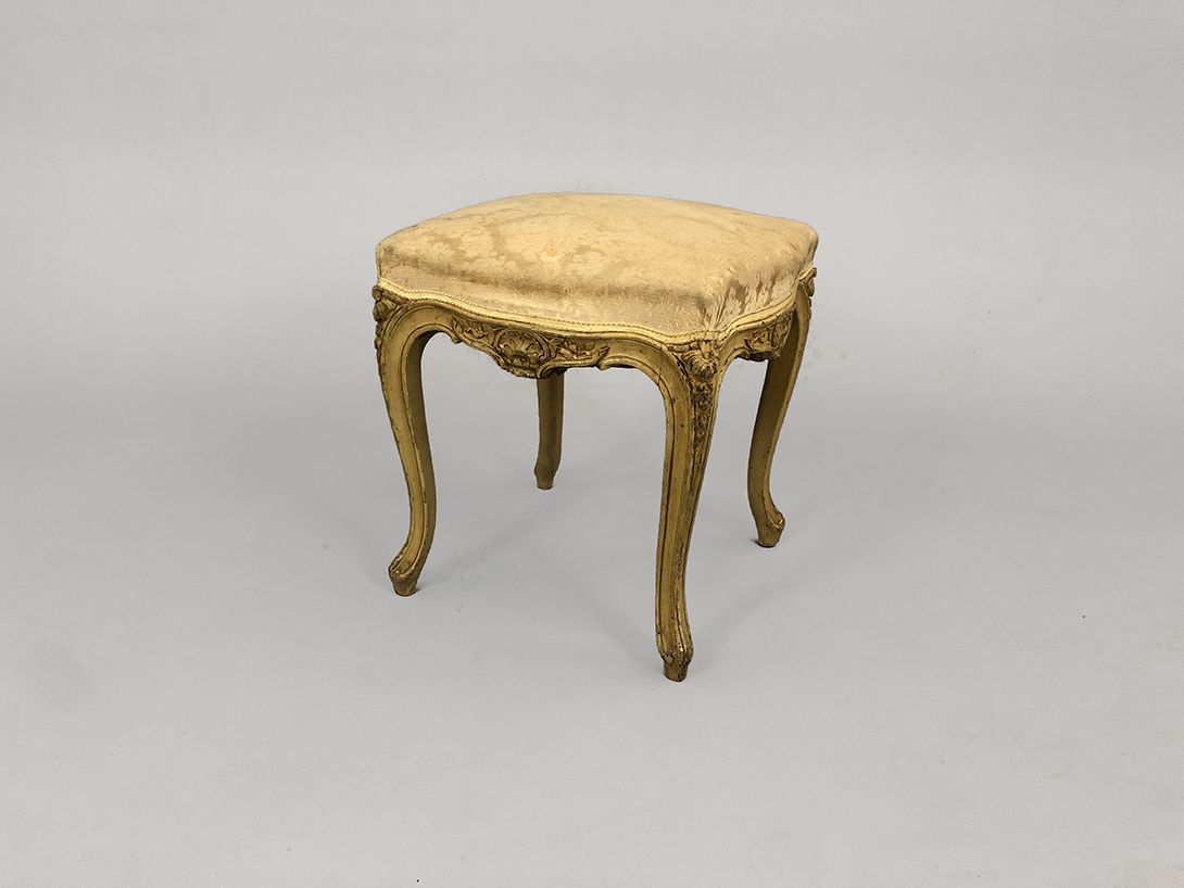Foto Antique Stool with Light Patterned Upholstery