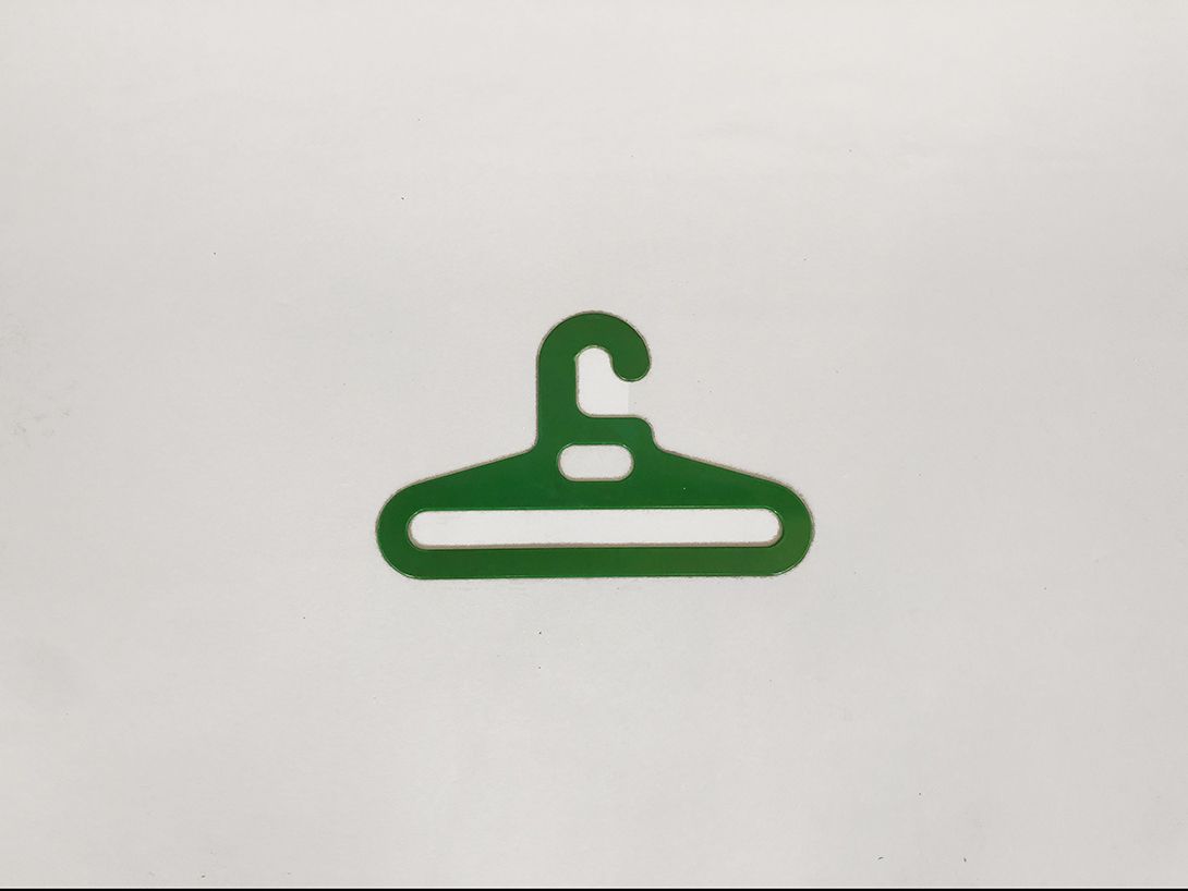 Foto Green Plastic Hanger