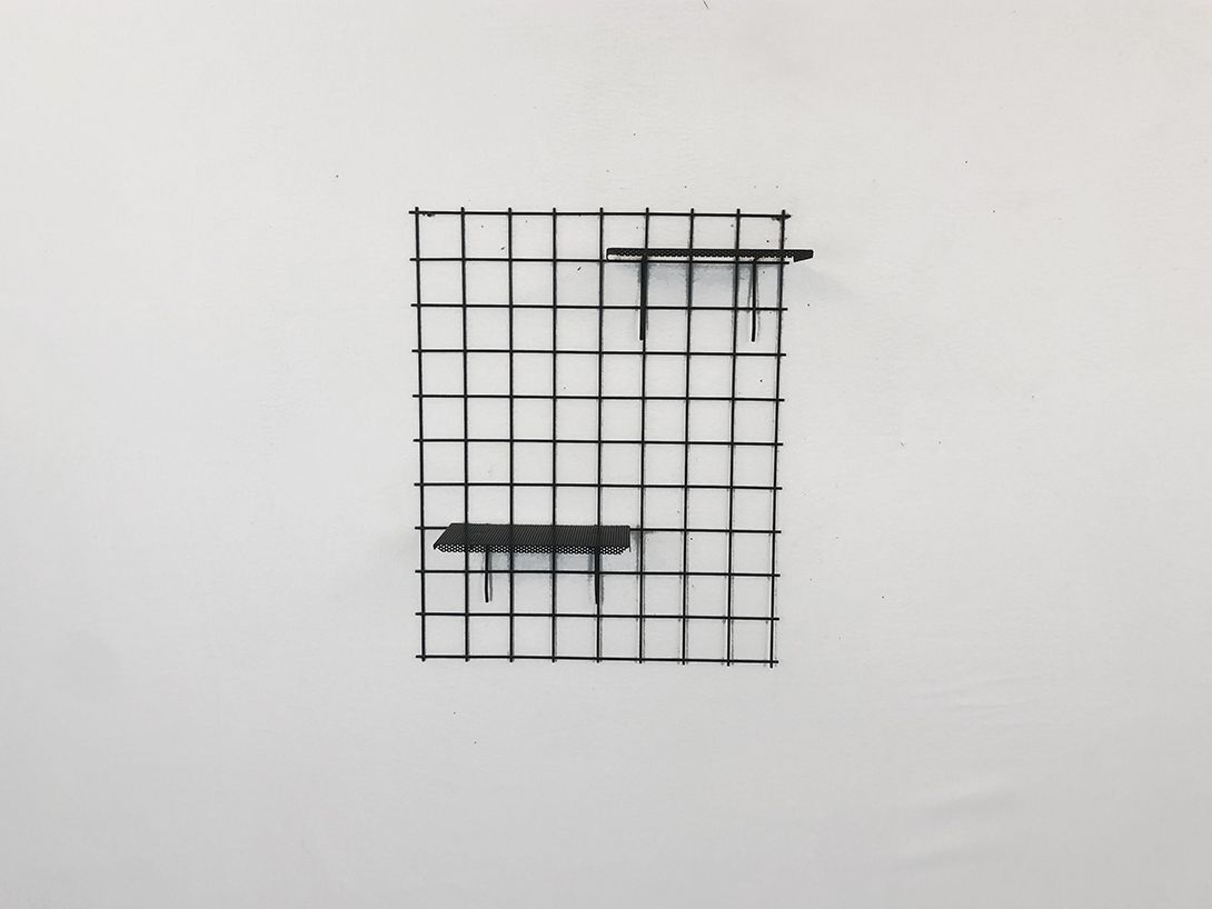 Foto Black Grid Wall Unit with Perforated Metal Shelves 1 of 3