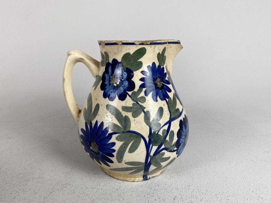 Foto Used Ceramic Jug with Handpainted Flowers