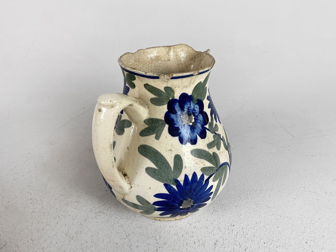 Foto Used Ceramic Jug with Handpainted Flowers