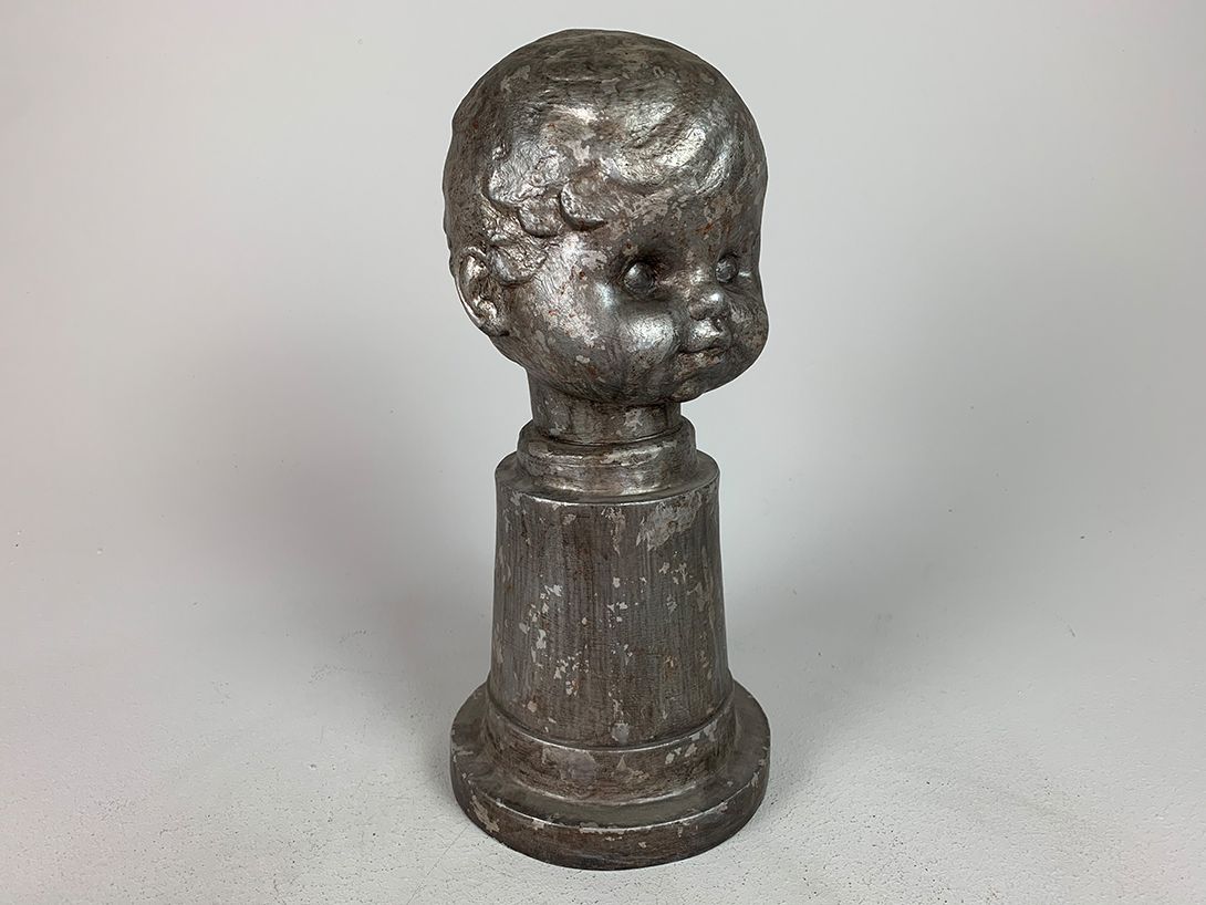 Foto Metallic Doll&#8217;s Head Sculpture h38