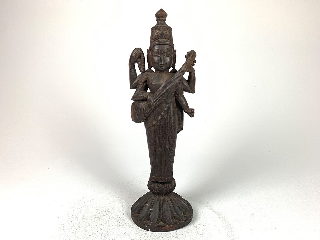 Foto Wooden Sculpture with Instrument Bali h43
