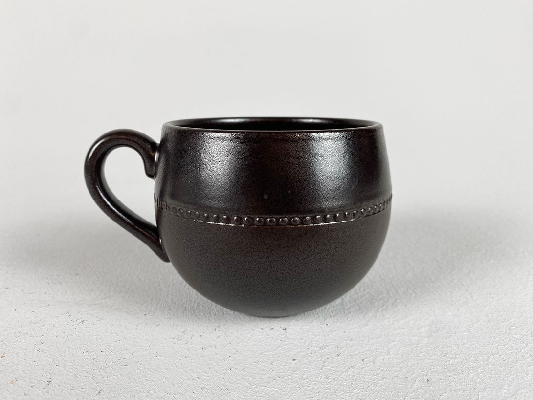 Foto Seven Brown Ceramic Cups, Sweden