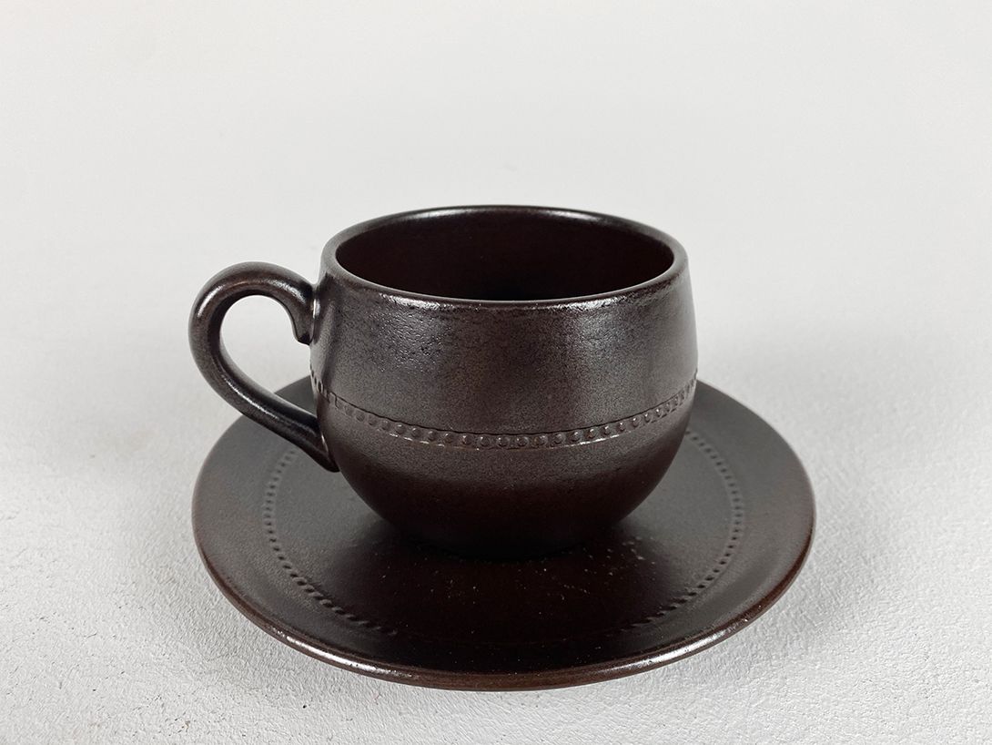 Foto Seven Brown Ceramic Cups, Sweden