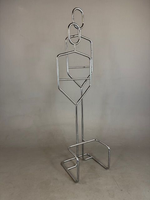 Foto Chrome Standing Coat Racks in the Shape of Persons