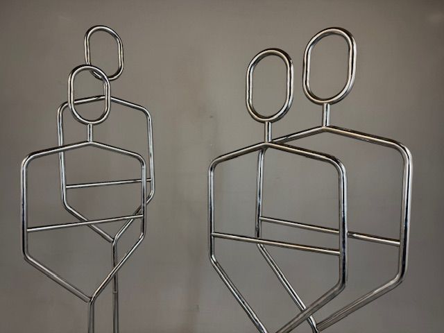 Foto Chrome Standing Coat Racks in the Shape of Persons